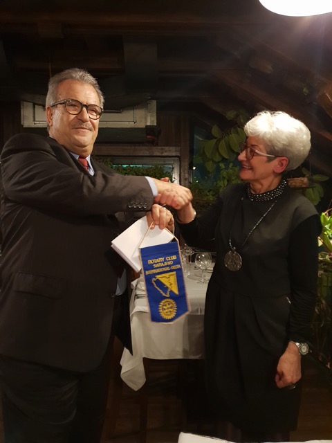 A friend Luciano exchanged flags with RCSID President Zeljka Mudrovcic